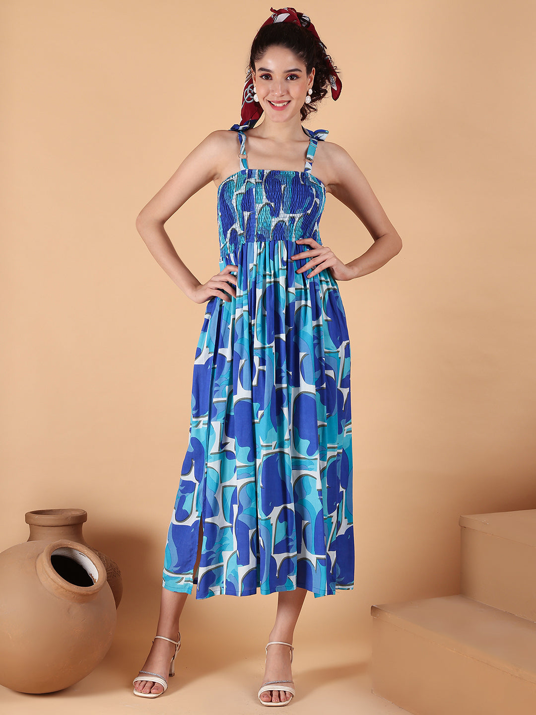 Aawari Blue Abstract Printed Rayon Bobbin dress with Tie-Up Straps - Western Wear