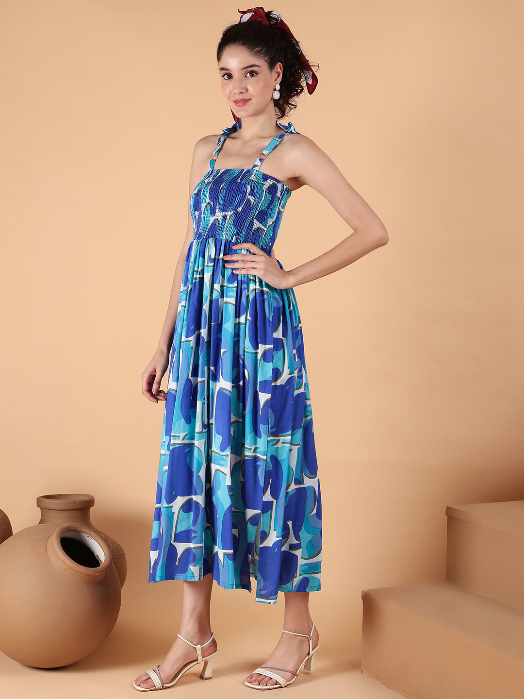 Aawari Blue Abstract Printed Rayon Bobbin dress with Tie-Up Straps - Western Wear