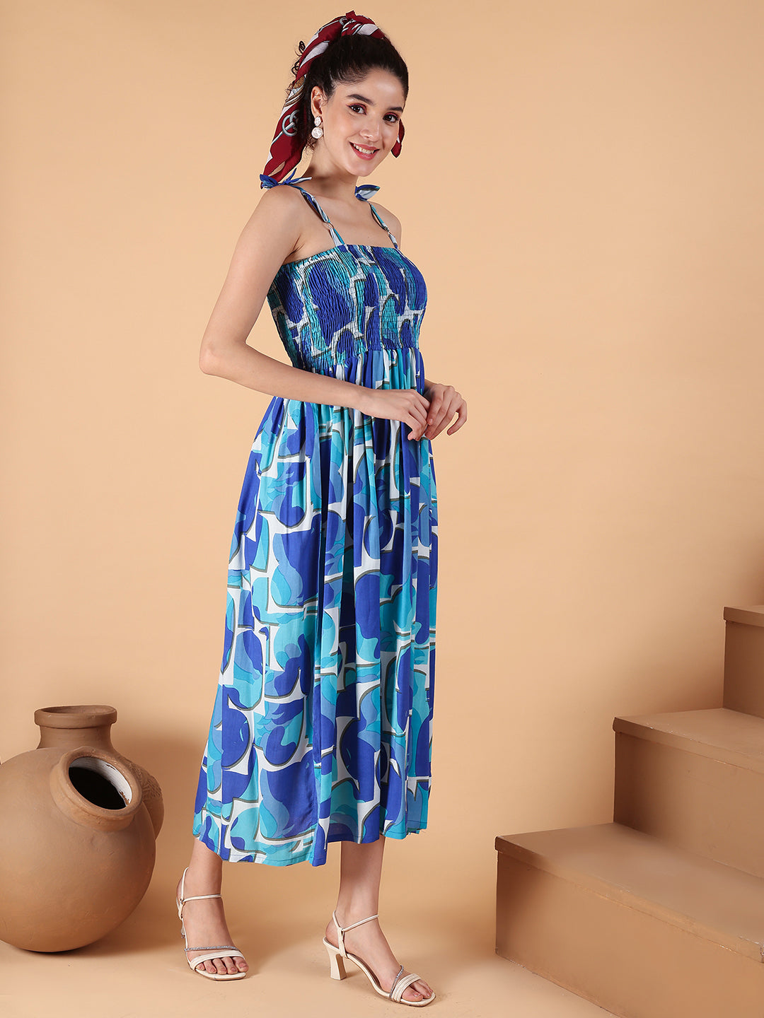 Aawari Blue Abstract Printed Rayon Bobbin dress with Tie-Up Straps - Western Wear