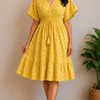 Women Yellow Abstract Printed Smocked Waist Flared Midi Dress