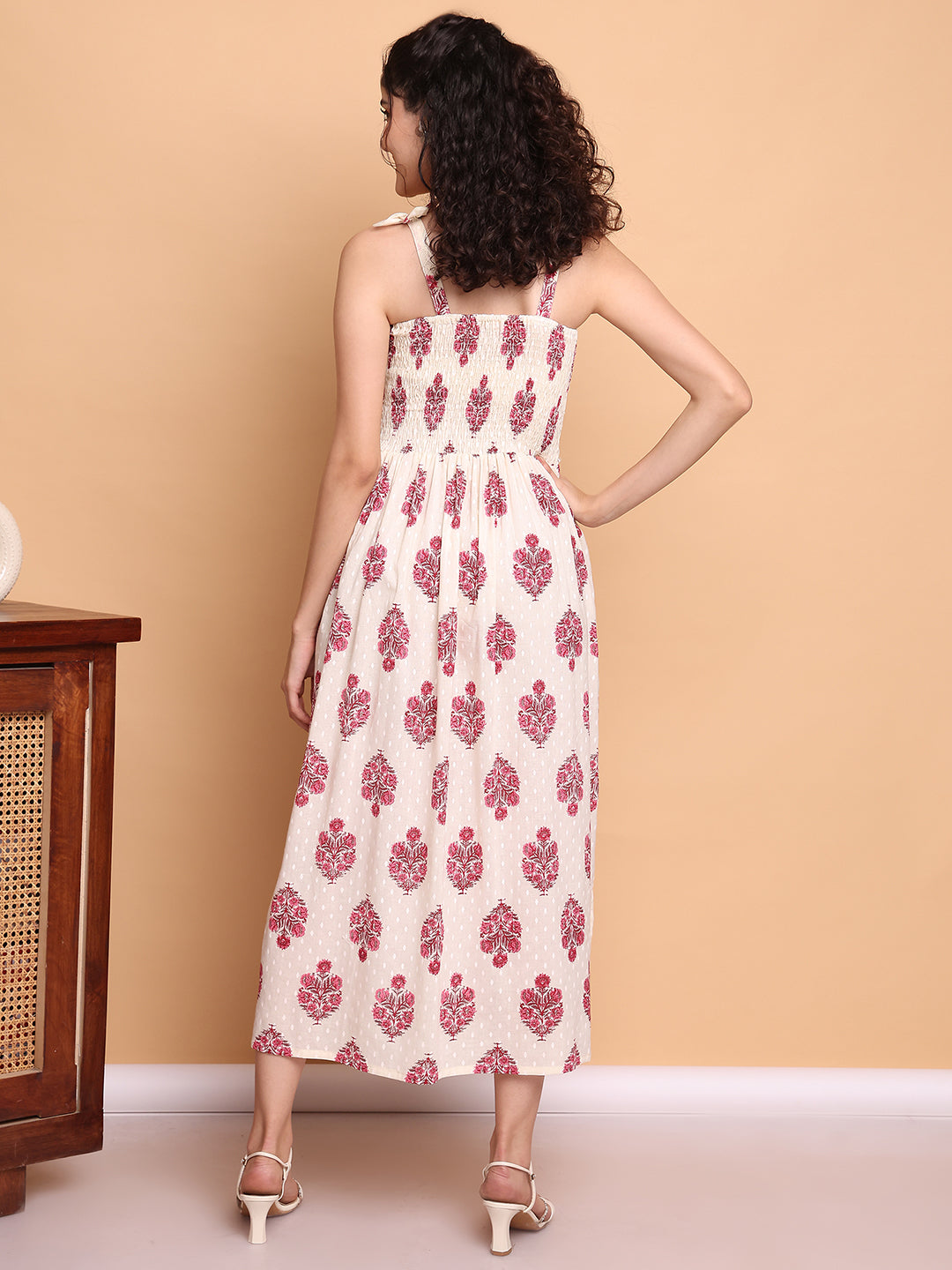 Aawari Elegant Cream & Pink Floral Printed Cotton Bobbin Gown with Tie-Up Straps for Women - Western wear