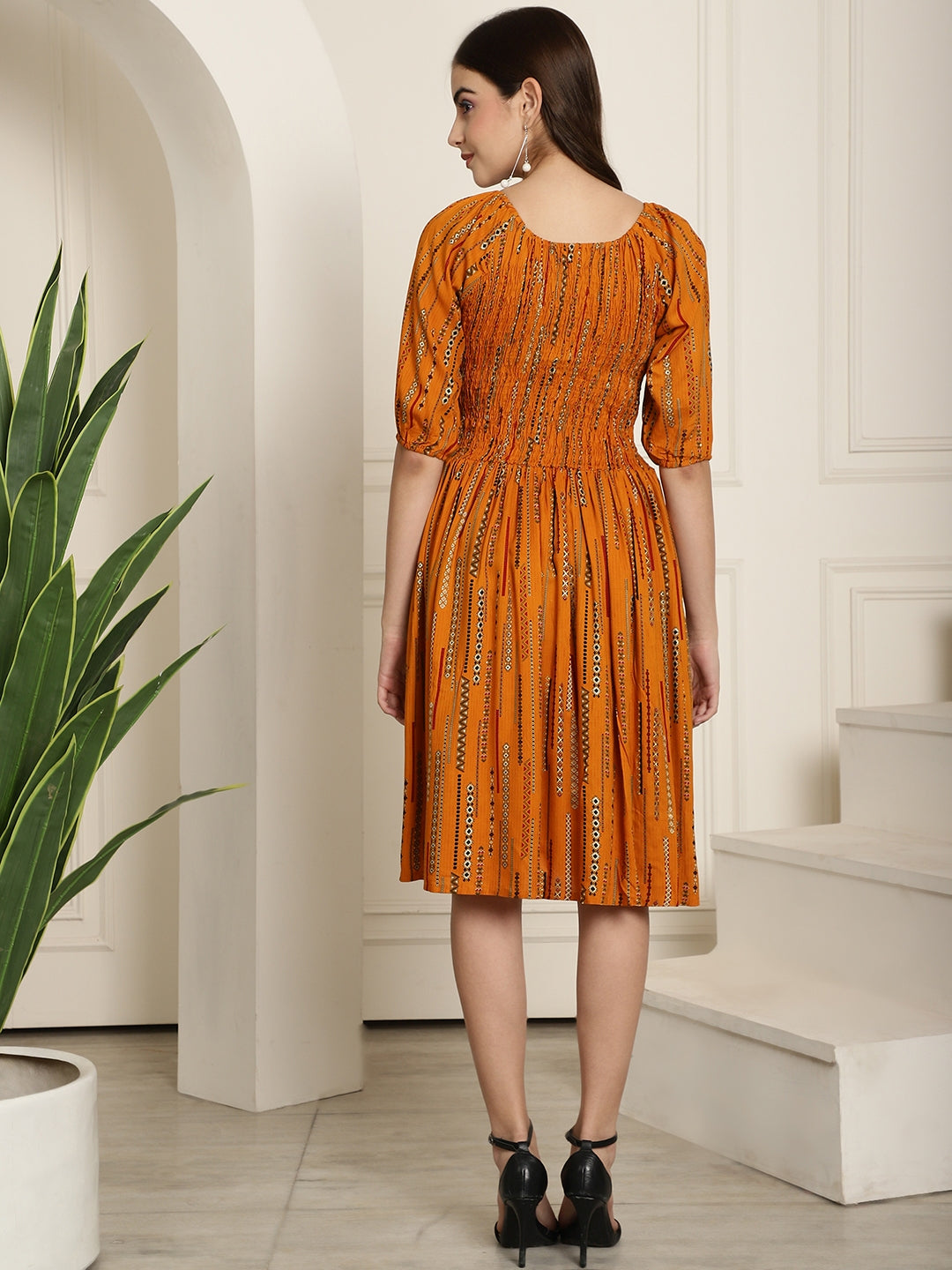 Aawari Mustard Printed A-Line Midi Dress With Extended Sleeves