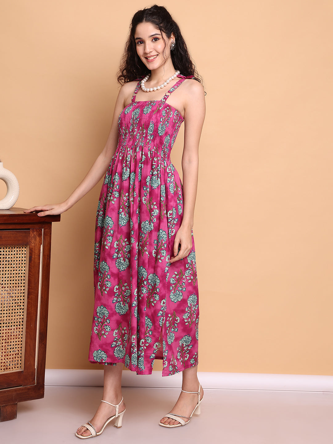 Aawari Vibrant Pink & Green Floral Printed Cotton Bobbin Gown with Tie-Up Straps for Women - Western wear