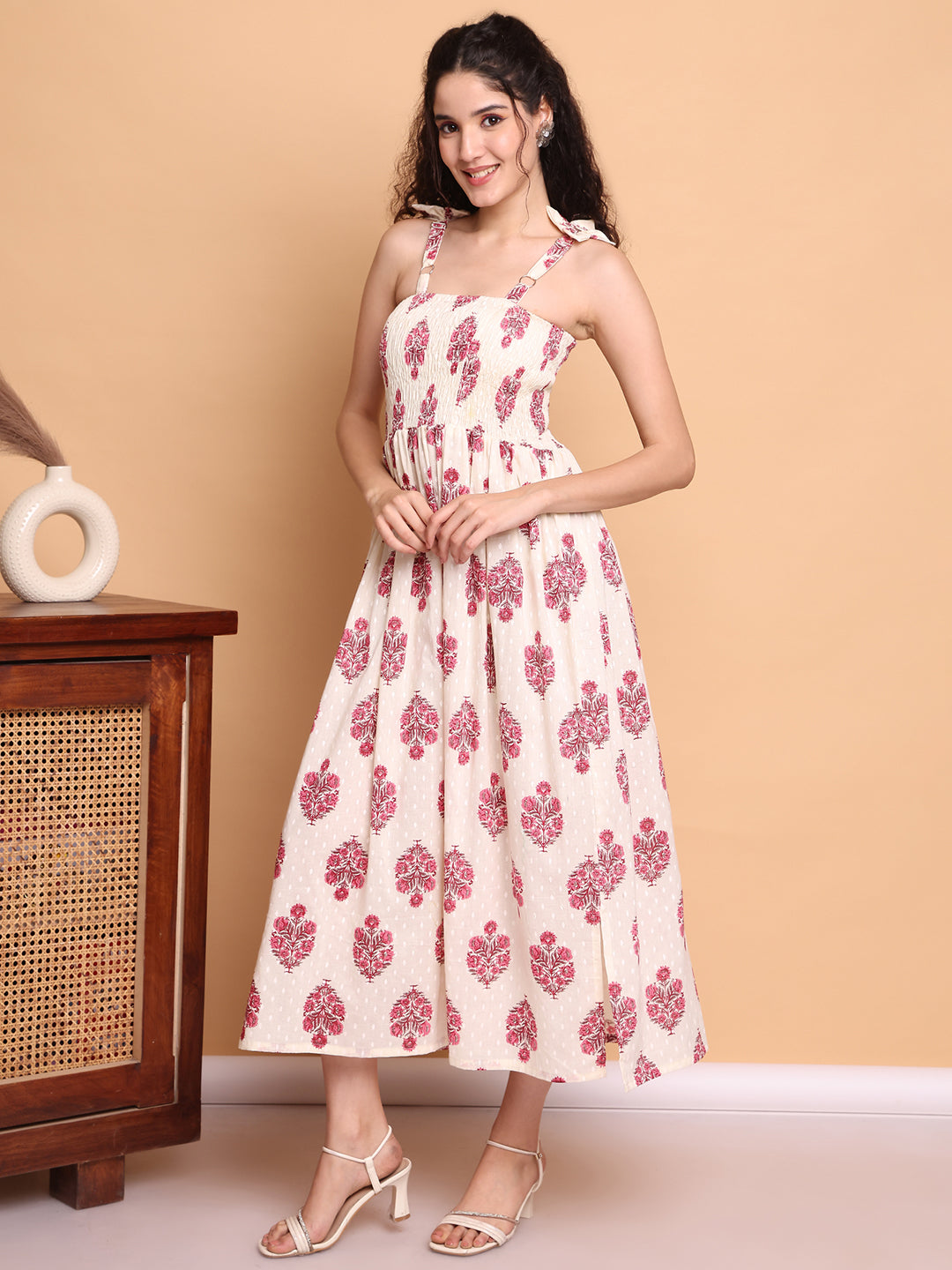 Aawari Elegant Cream & Pink Floral Printed Cotton Bobbin Gown with Tie-Up Straps for Women - Western wear