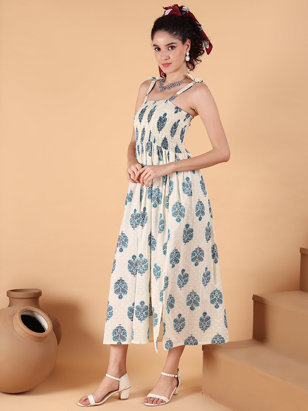 Aawari Elegant Cream & Blue Printed Printed Cotton Bobbin Gown with Tie-Up Straps for Women - Western wear