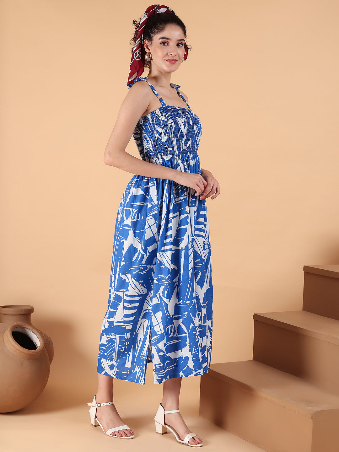 Aawari Blue & White Abstract Printed Cotton Bobbin Gown with Tie-Up Straps for Women - Western wear