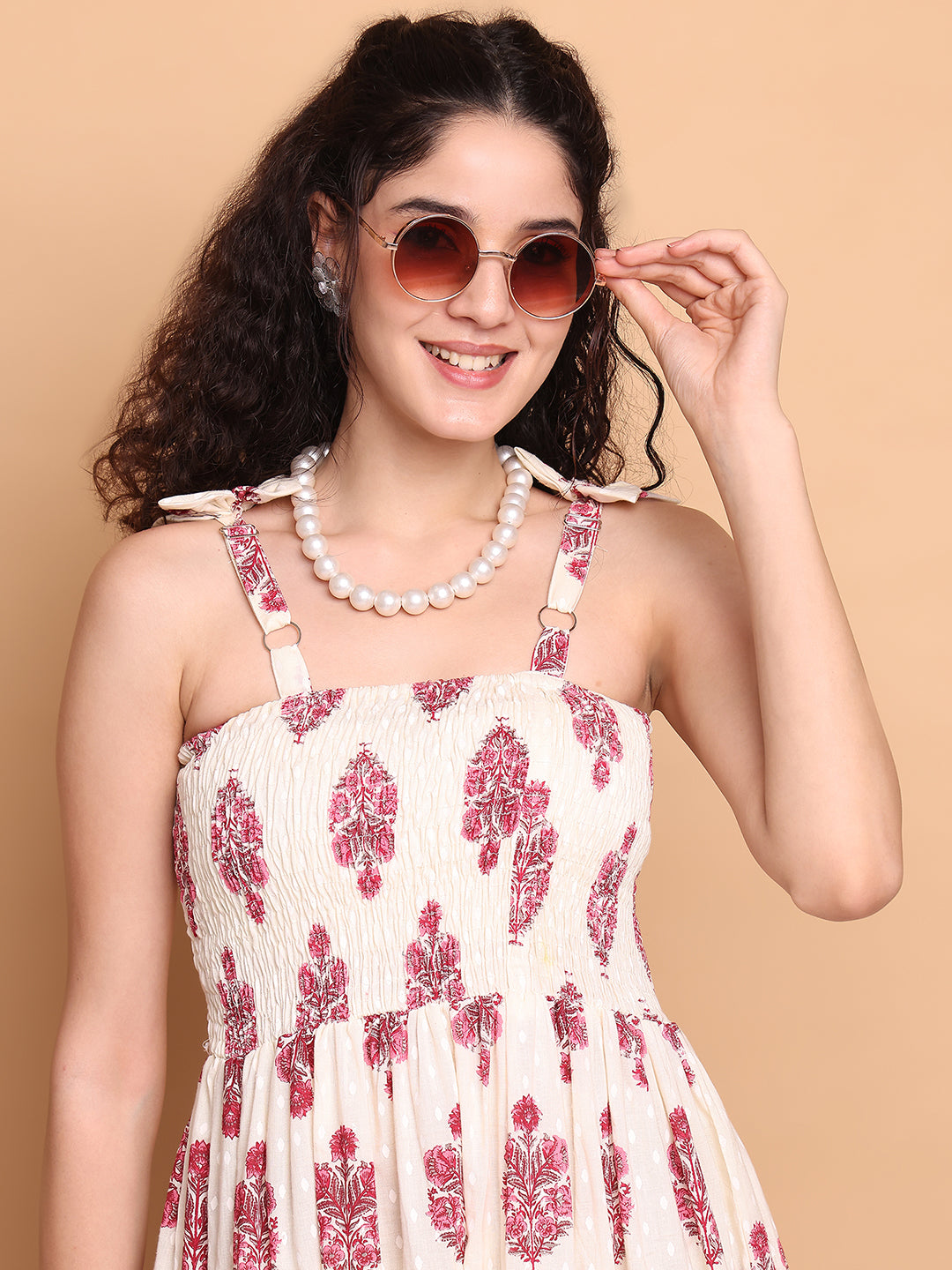 Aawari Elegant Cream & Pink Floral Printed Cotton Bobbin Gown with Tie-Up Straps for Women - Western wear