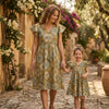 Mom & Me Green Circular Printed Cotton Umbrella Style A-Line Dress with Drawstring Waist