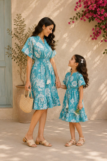 Mom & Daughter Aqua Bloom Printed Matching Smocked Waist Flared Dress Set with Tassel Tie-Up Detail