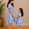 Mom & Daughter Lavender Bloom Printed Matching Smocked Waist Flared Dress Set with Tassel Tie-Up Detail