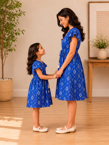 Mom & Daughter Blue Ikat Printed Matching Smocked Waist Flared Dress Set with Tassel Tie-Up Detail