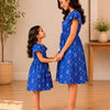 Mom & Daughter Blue Ikat Printed Matching Smocked Waist Flared Dress Set with Tassel Tie-Up Detail