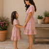 Mom & Daughter Peach Floral Printed Smocked Waist Matching Flared Dress Set with Tassel Tie-Up Detail