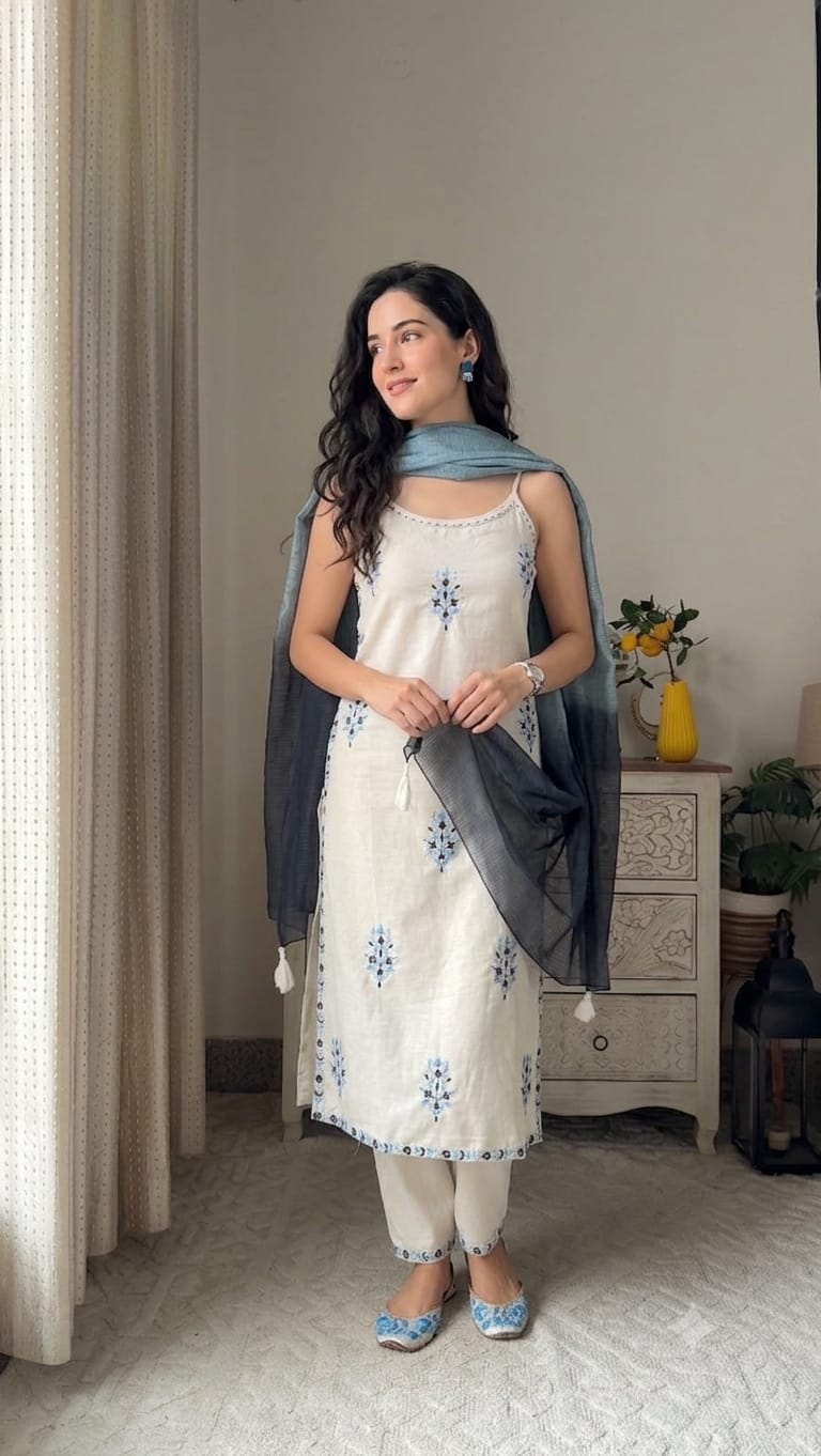 Women's Full embroidered kurti with lace work on kurta and pant and Handwork detailing on neck and tassels with pearl