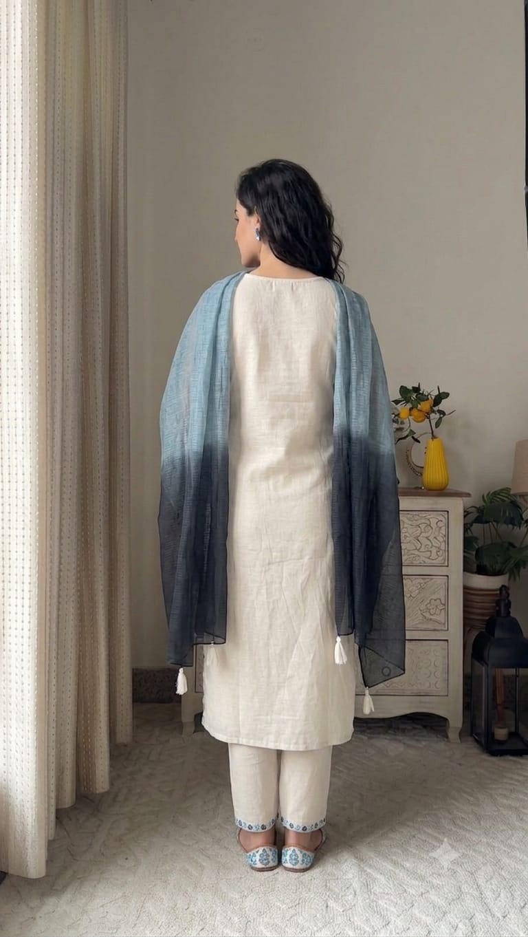 Women's Full embroidered kurti with lace work on kurta and pant and Handwork detailing on neck and tassels with pearl
