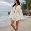 Women’s White Solid Cotton Beach Wear Set with Bell Sleeve Tie-Up Top & Tassel Shorts