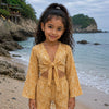 Girl’s Mustard Yellow Printed Cotton Beach Wear Set with Bell Sleeve Tie-Up Top & Tassel Shorts