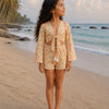Girl’s Multicolor Geometric Printed Cotton Beach Wear Set with Bell Sleeve Tie-Up Top & Tassel Shorts
