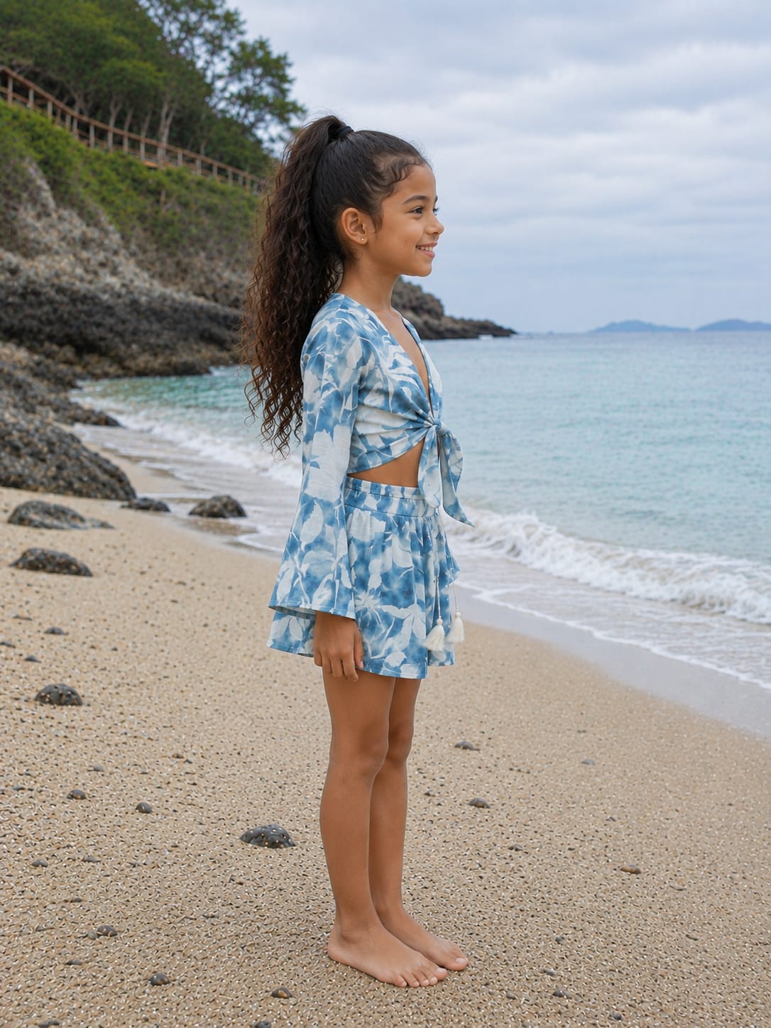 Girl’s Sky Blue Floral Printed Cotton Beach Wear Set with Bell Sleeve Tie-Up Top & Tassel Shorts