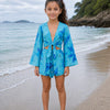 Girl’s Turquoise Blue Abstract Printed Cotton Beach Wear Set with Bell Sleeve Tie-Up Top & Tassel Shorts