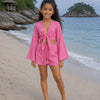 Girls Pink Abstract Printed Cotton Beach Wear Set with Bell Sleeve Tie-Up Top & Tassel Shorts