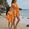 Mom & Daughter Orange Abstract Printed Cotton Beach Wear Set with Bell Sleeve Tie-Up Top & Tassel Shorts