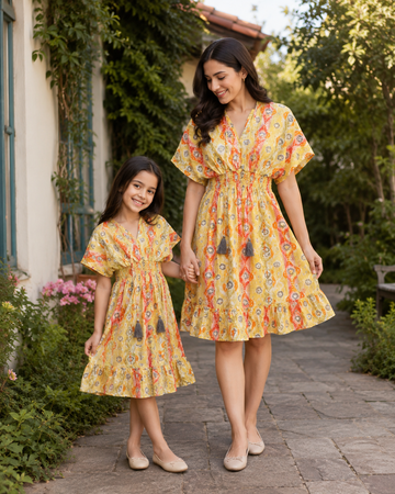 Mom & Daughter Yellow Ethnic Printed Matching Flared Dress Set with Tassel Tie-Up Detail