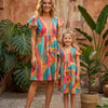 Mom & Me Multicolor Mix Leaf Printed Cotton Umbrella Style A-Line Dress with Drawstring Waist